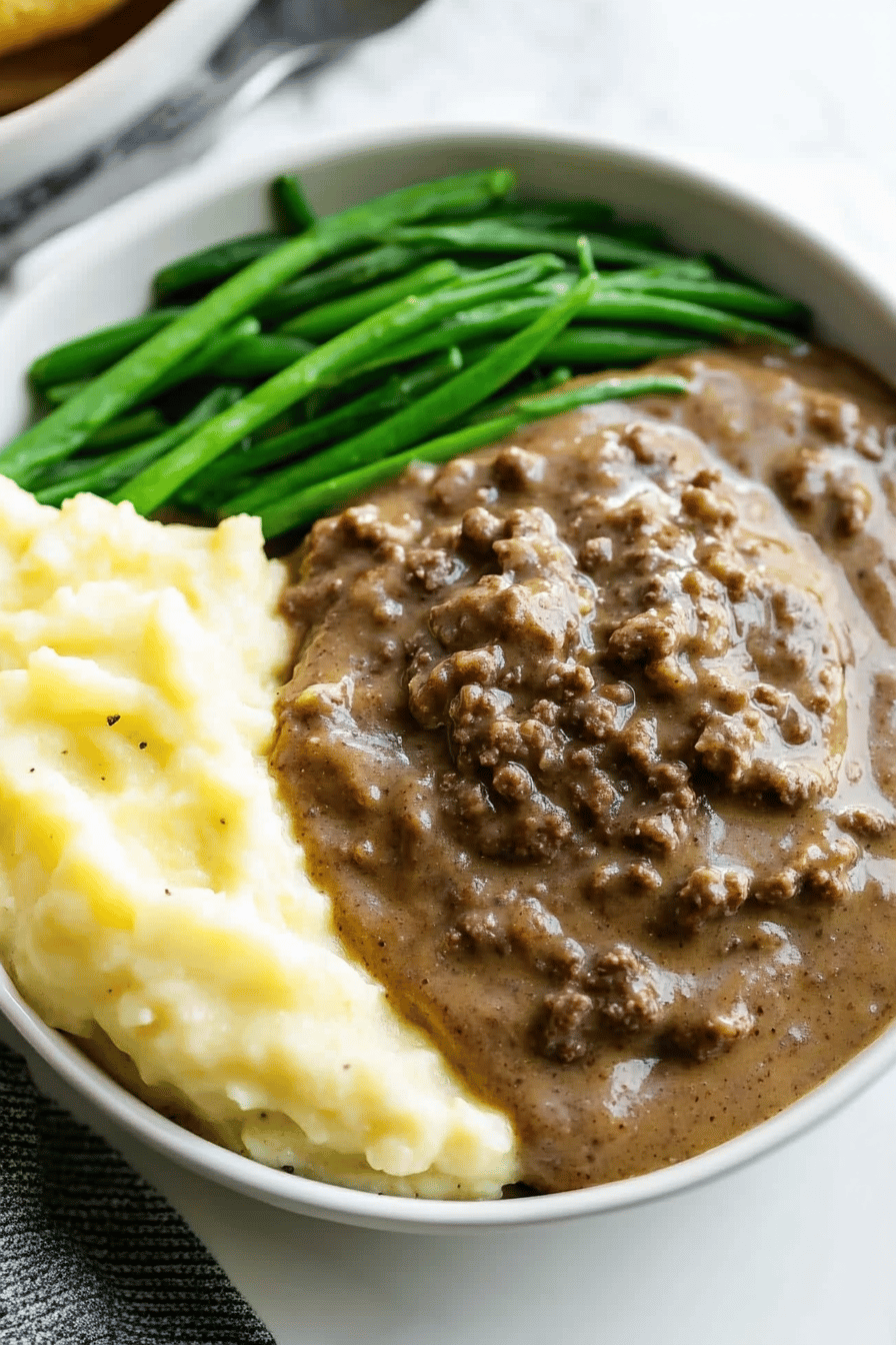 Hamburger Gravy slice on plate showing perfect texture and swirl pattern