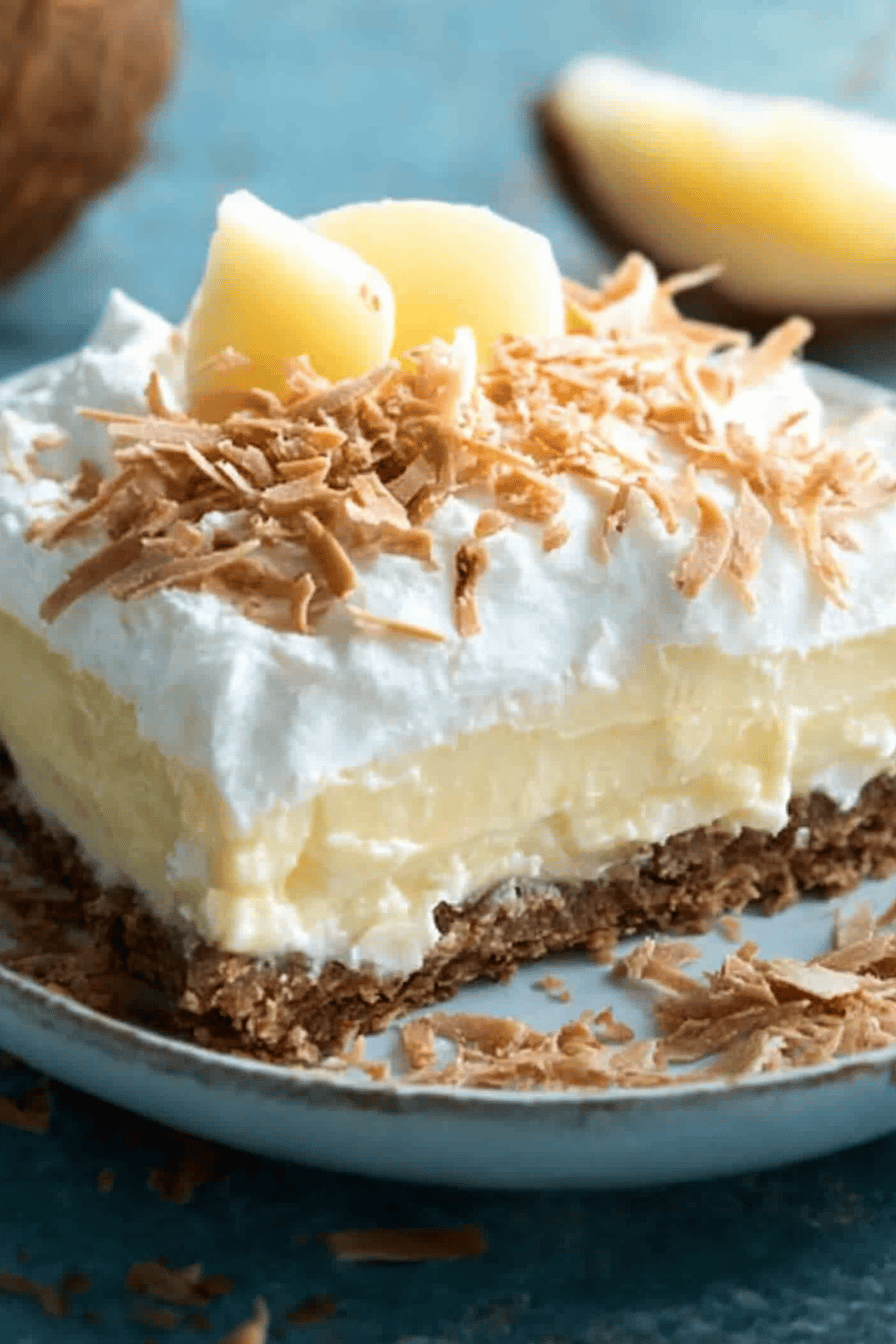 Coconut Cream slice on plate showing perfect texture and swirl pattern