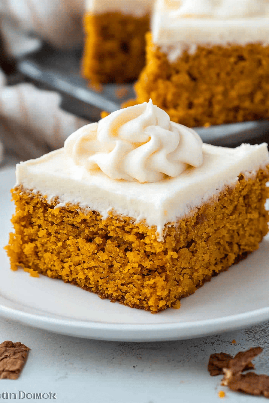Paula Deen Pumpkin Bars slice on plate showing perfect texture and swirl pattern