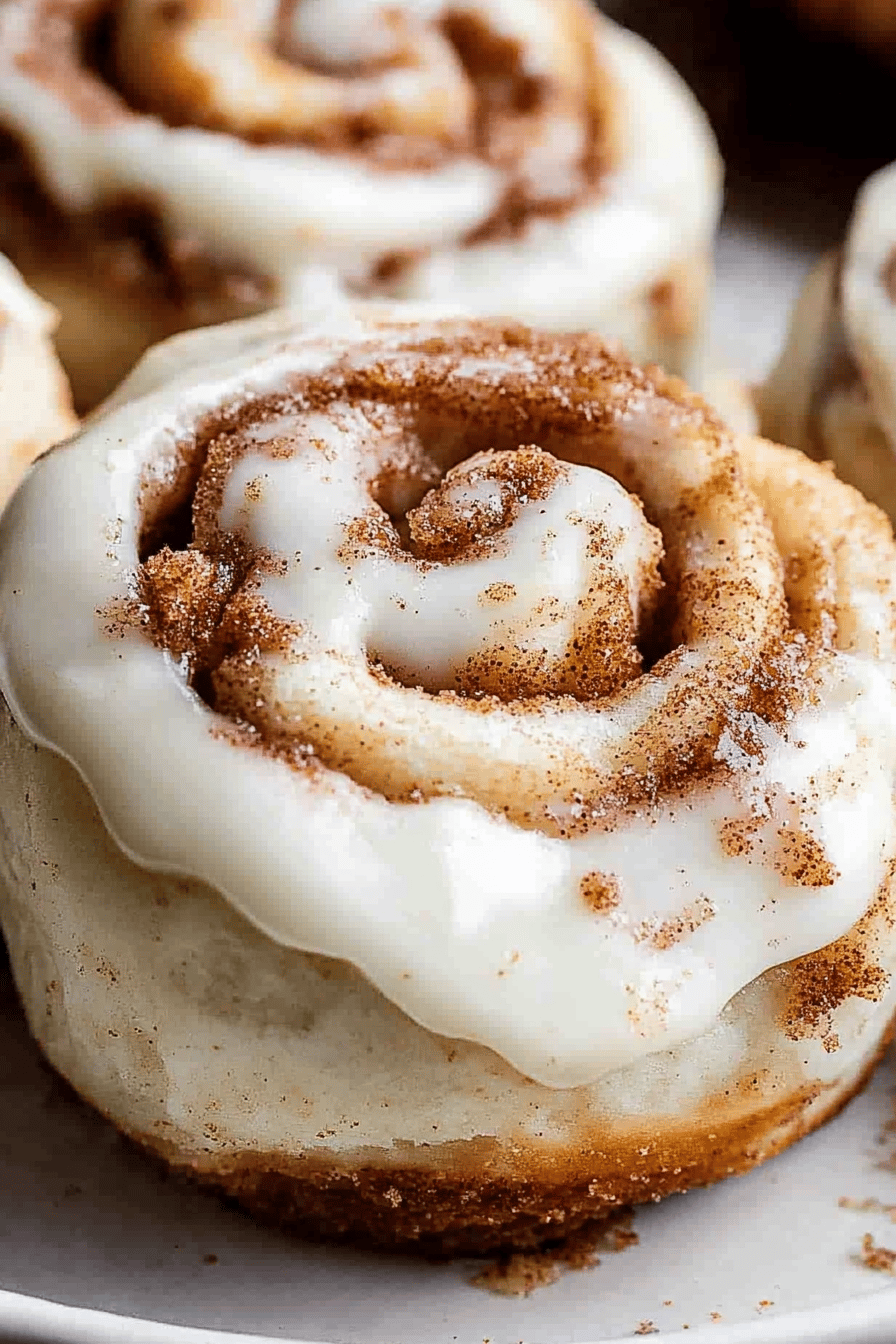 Protein Cinnamon Rolls slice on plate showing perfect texture and swirl pattern