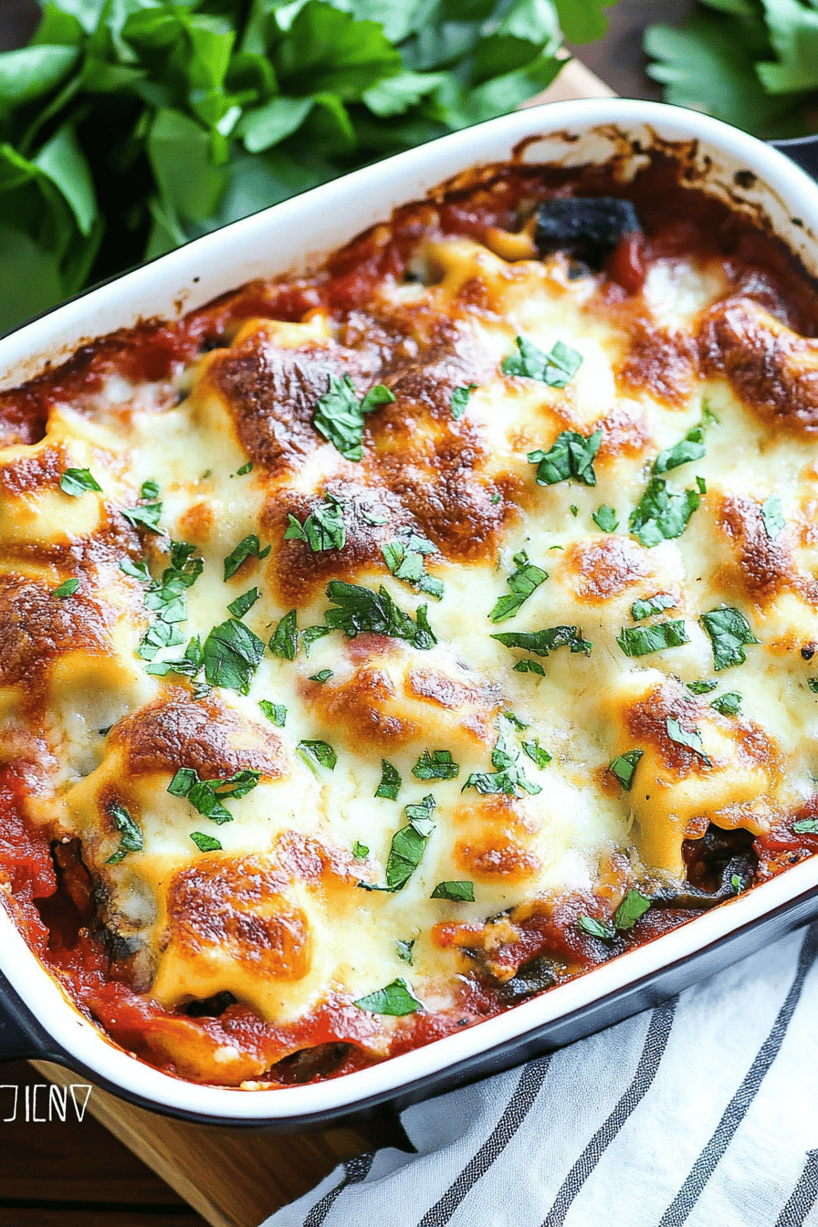 Ravioli lasagna slice on plate showing perfect texture and swirl pattern