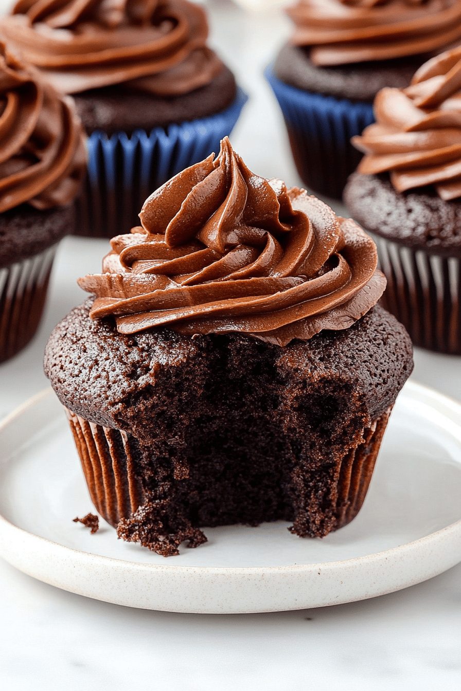 chocolate cupcakes slice on plate showing perfect texture and swirl pattern
