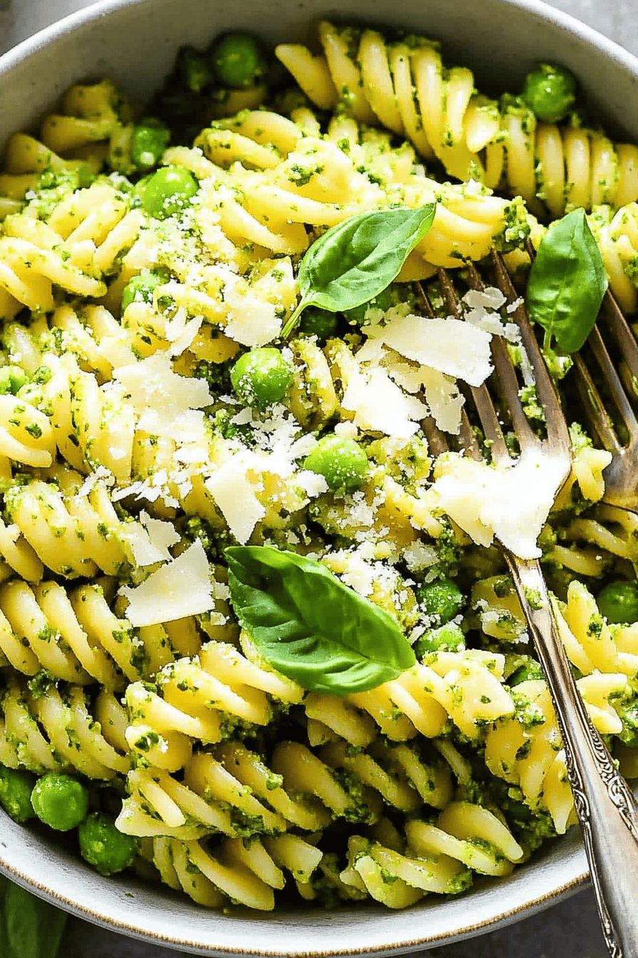 sweet pea pesto pasta ingredients organized and measured on kitchen counter