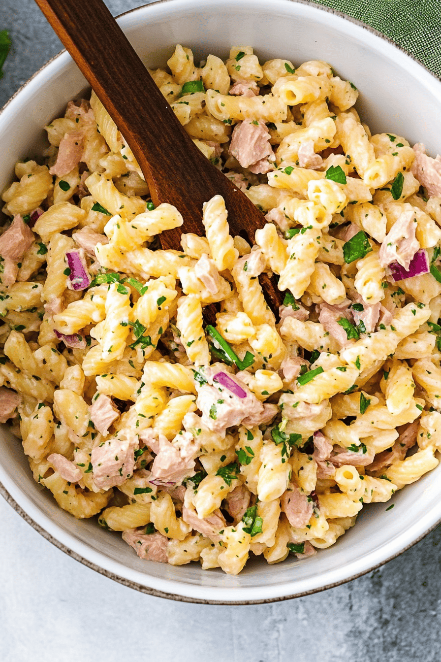 tuna pasta salad ingredients organized and measured on kitchen counter
