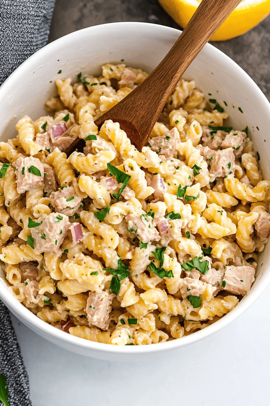 tuna pasta salad slice on plate showing perfect texture and swirl pattern