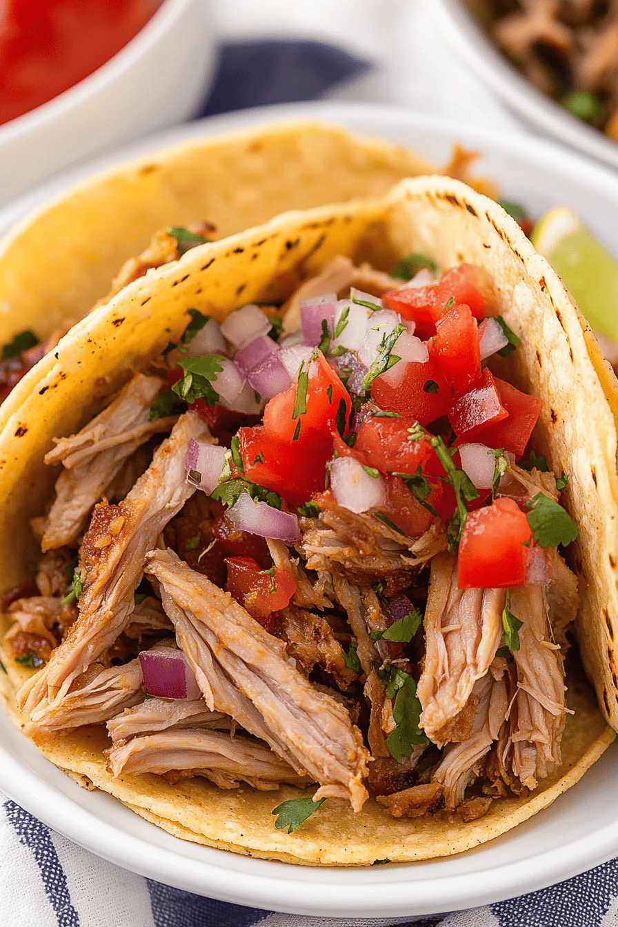 pork carnitas slice on plate showing perfect texture and swirl pattern